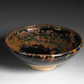 A Cizhou type <b>black</b> <b>glazed</b> <b>stoneware</b> bowl with russet splashes. Northern Song/Jin Dynasty