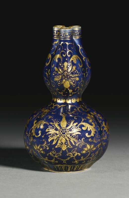 A rare blue-ground gilt-decorated conjoined triple-neck double-gourd vase, Qianlong seal mark and period (1736-1795)