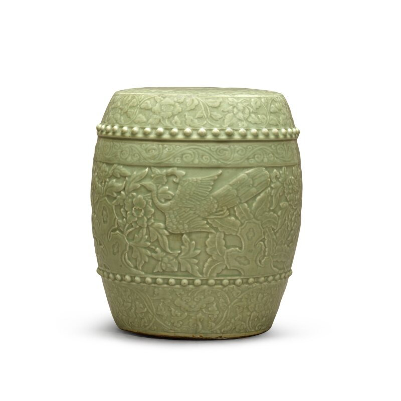 A moulded Longquan celadon 'peacock' garden stool, 14th - early 15th century