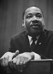 250px_Martin_Luther_King_1964_leaning_on_a_lectern
