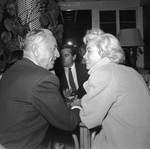 1954_Marilyn_Natural_011_Coat_inRacquetClub_withWPowell