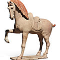 ﻿A large painted pottery figure of a <b>prancing</b> <b>horse</b>, Tang dynasty (618-907)