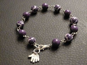 bracelet perles fleurs violettes 5euros