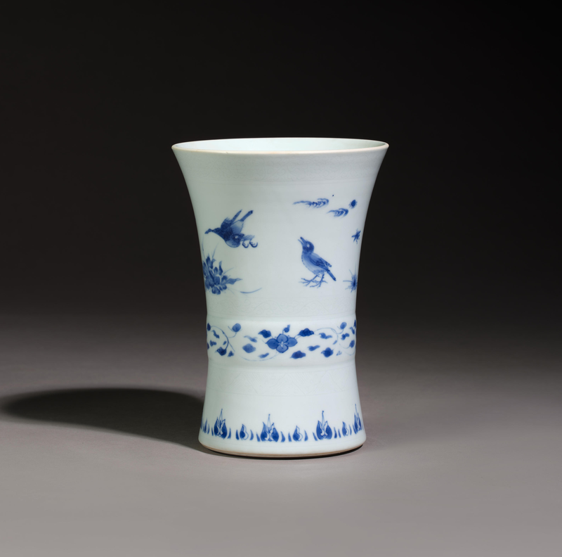 A rare blue abd white 'bird and flower' brushpot, Chongzhen period (1627-1644)