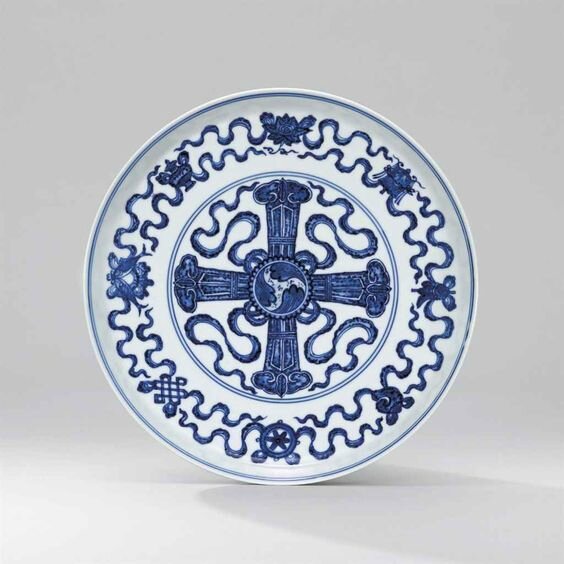 A blue and white 'bajixiang and double-vajra' dish, Qianlong six-character seal mark in underglaze blue and of the period (1736-1795)