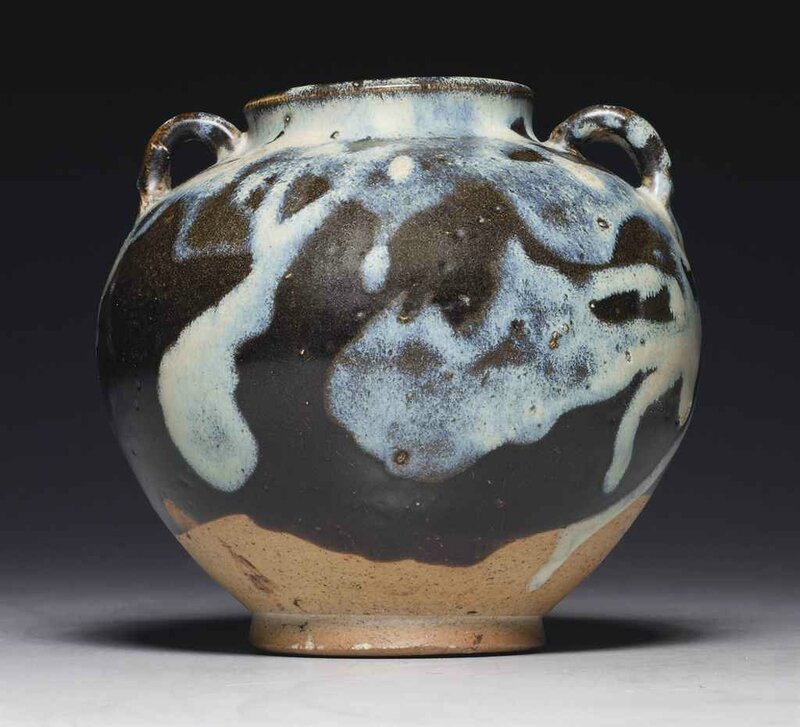 A small phosphatic glaze-splashed brown-glazed jar, Tang dynasty (618-907)