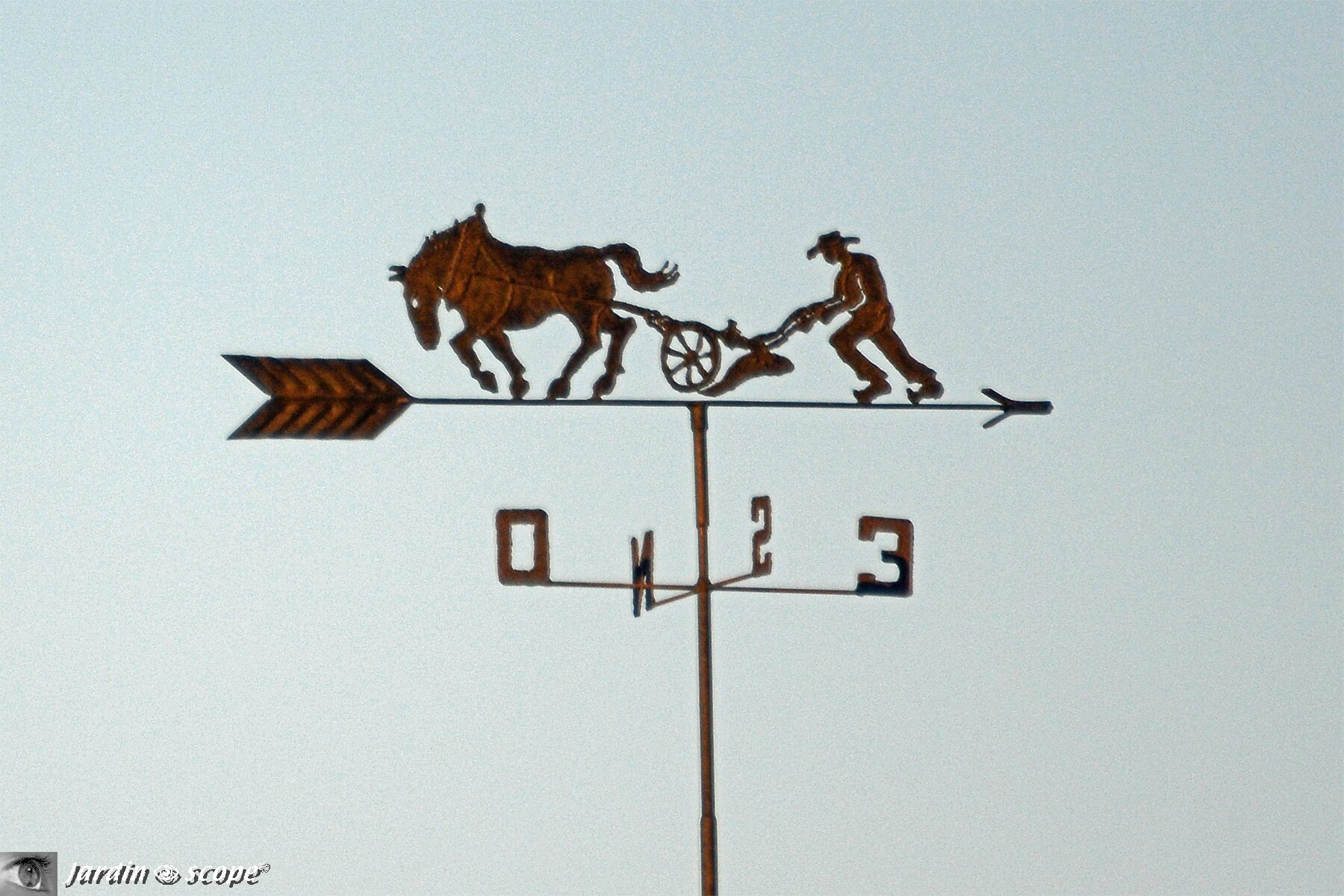 Girouette à la charrue tirée par un cheval