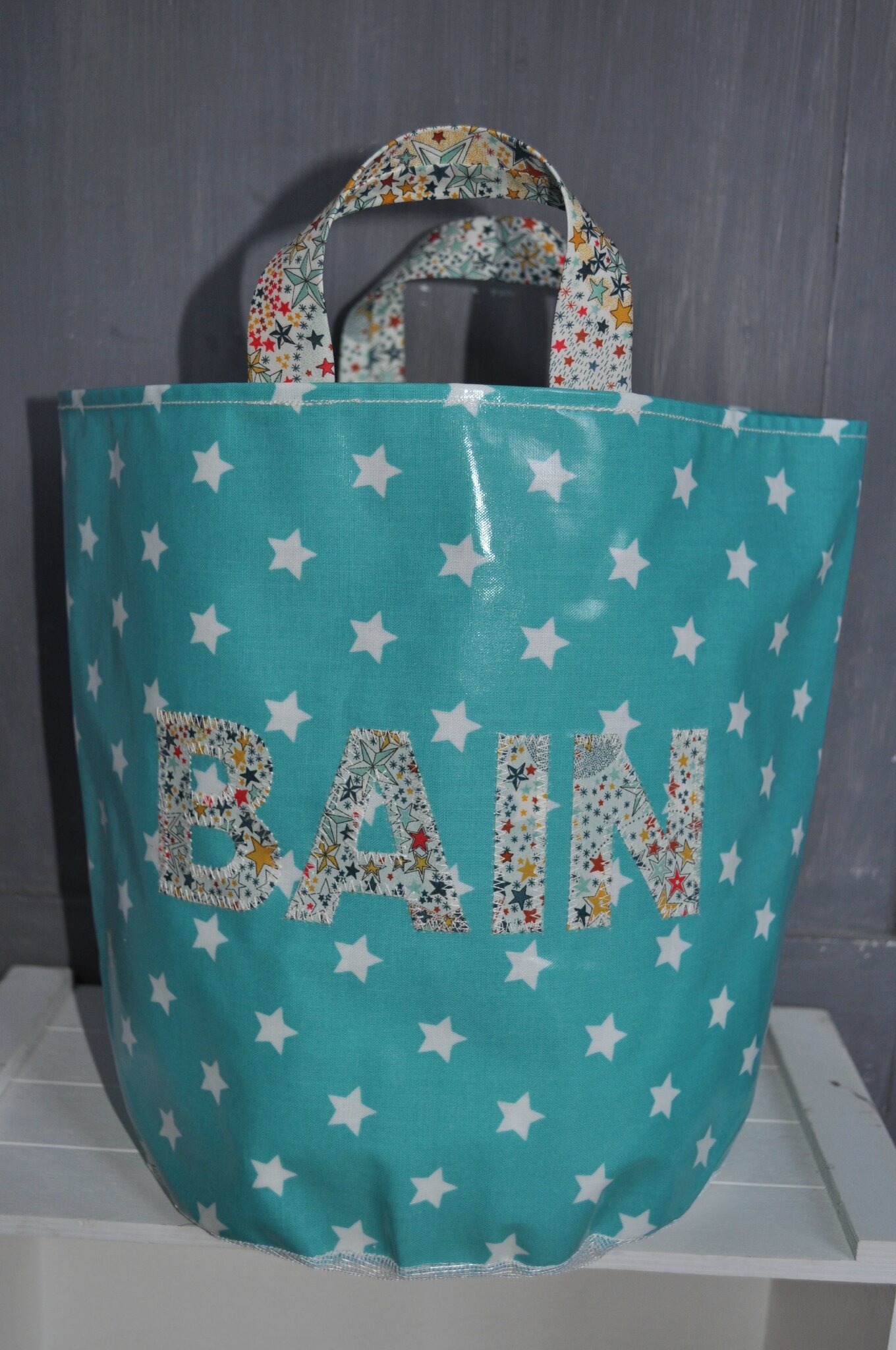 sac jeux de bain vert mint à étoiles