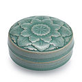 A superbly carved celadon-glazed 'lotus' box and cover, Korea, <b>Koryo</b> <b>dynasty</b>