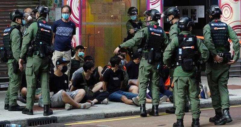Police-detain-a-group-of-protestors-in-Hong-Kong-in-June-2020-Photo-AP