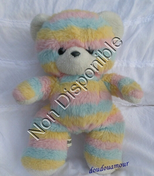 Doudou Peluche Ours Arc en Ciel Multicolore Rose Bleu Jaune Grelot Ajena 36 cm