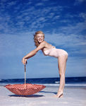 1949_tobey_beach_by_dedienes_umbrella_red_060_1