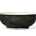 A <b>black</b> <b>and</b> <b>white</b>-<b>glazed</b> bowl, Tang dynasty (AD 618-907)