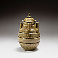 A 'Longquan' <b>celadon</b>-<b>glazed</b> five-spouted jar and cover, Five dynasties (907-960)