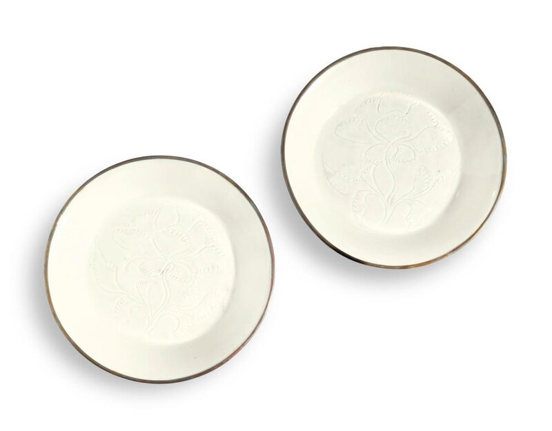 Two small carved Ding dishes, Northern Song dynasty (960-1127)