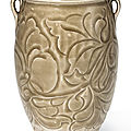 A rare carved Yaozhou celadon 'floral' jar, Northern Song dynasty (960-1127)