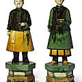 A pair of tileworks figures of male <b>and</b> female attendants, Ming dynasty (1368-1644)