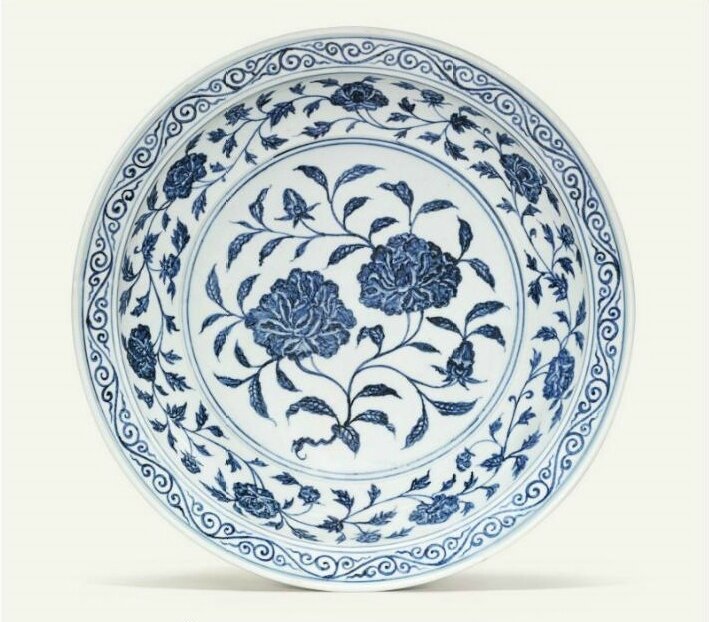 A large rare early Ming blue and white 'peony' dish, Yongle period (1403-1425)