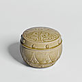 A 'Yaozhou' celadon <b>carved</b> <b>box</b> <b>and</b> <b>cover</b>, Northern Song dynasty (960-1127)