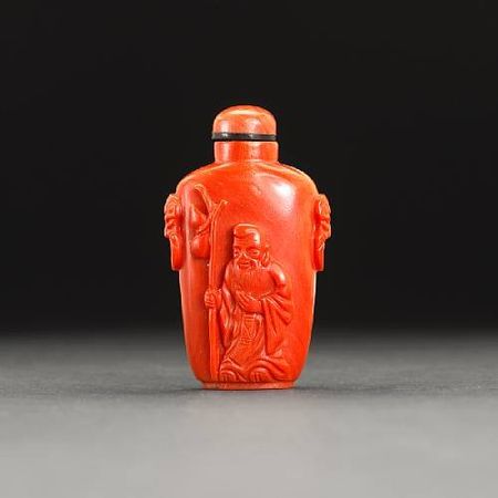 A_carved_coral_snuff_bottle