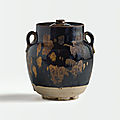 A russet-splashed black-glazed jar and cover, Northern Song dynasty (960-1127)