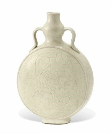 A 'soft-paste' relief-decorated moon flask, 18th century