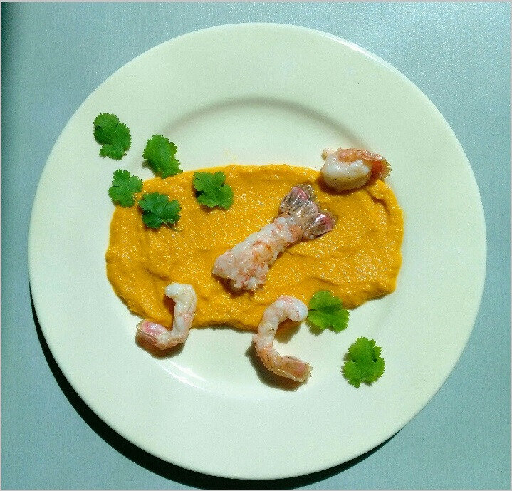 Créme de carottes au café, gingembre et langoustines poêlées