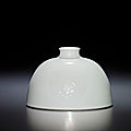 A fine and rare white-glazed beehive <b>water</b> <b>pot</b>, Kangxi six-character mark and of the period (1662-1722)