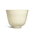 A rare large white-glazed cup, <b>Sui</b> <b>dynasty</b> (581-618)