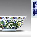 A fine wucai-decorated dragon and phoenix bowl, Qianlong seal mark in underglaze blue and of the period (1736-1795)