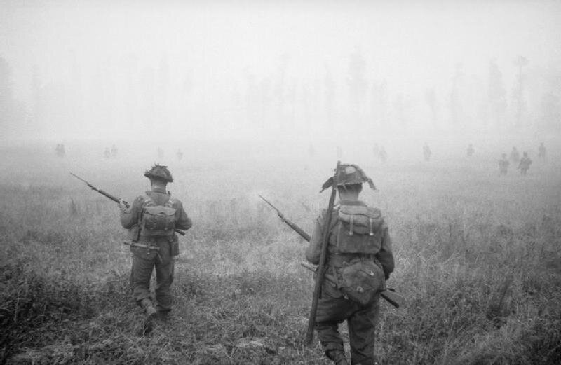Infantry_of_'B'_Company,_6th_Royal_Scots_Fusiliers,_15th_(Scottish)_Division,_advance_during_Operation_'Epsom'_in_Normandy,_26_June_1944__B5957