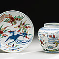 A Wucai '<b>boys</b>' <b>jar</b> and a ''Phoenix' dish, Ming Dynasty, 16th-17th century
