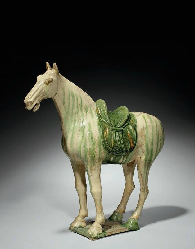 A large sancai-glazed pottery figure of a horse, Tang dynasty (AD 618-907)