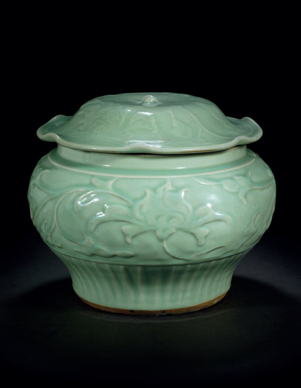 A Longquan celadon carved jar and cover, Yuan dynasty, 14th century