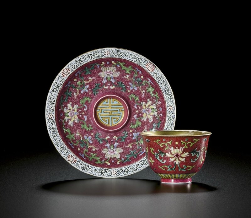 A rare famille-rose ruby ground wine cup and saucer, Seal mark and period of Qianlong (1736-1795)