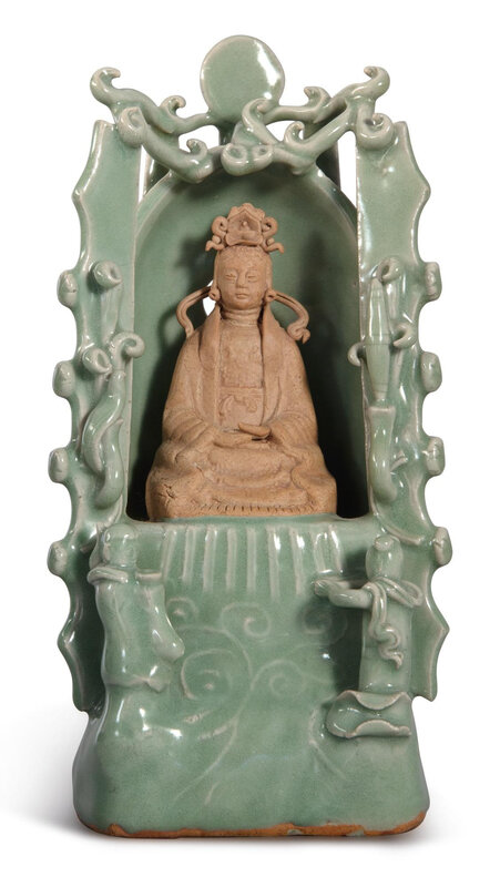 An unusual celadon-glazed and biscuit shrine of Guanyin, early Ming dynasty