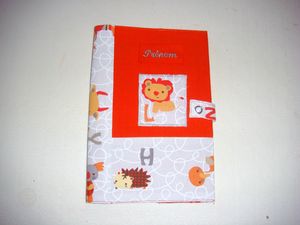 Protège-carnet Animaux et orange Lion face flash