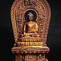 A rare gilt-lacquered wood figure of Buddha enthroned, <b>17th</b>-<b>18th</b> <b>century</b>