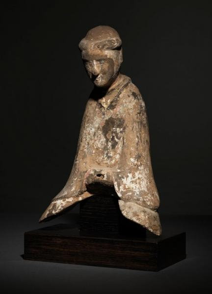 A painted potery seated figure, Han Dynasty (206 BC-220 AD)