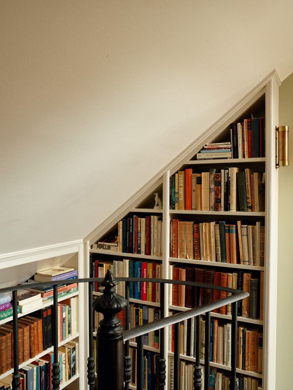 bookshelves-under-slanted-ceiling-nordroom-1125x1500