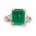 An emerald and <b>diamond</b> ring