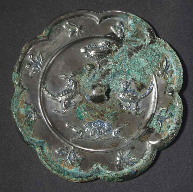 A silvery-grey bronze eight-lobed mirror, Tang dynasty (618-907)