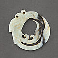 A black and white jade 'phoenix' pendant, probably <b>Western</b> <b>Han</b> <b>dynasty</b> (<b>206</b> <b>BC</b>–<b>9</b> <b>AD</b>)