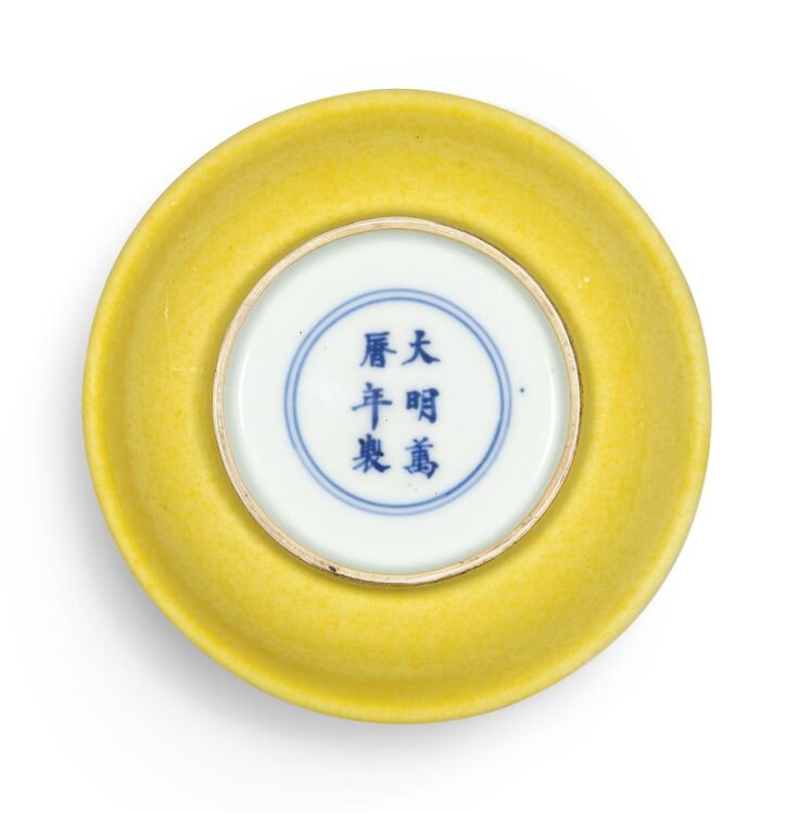 A small yellow-glazed dish, Mark and period of Wanli