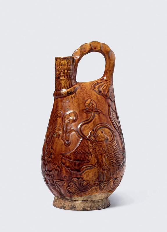 A Moulded Amber - Glazed ‘Kalavinka’ ‘Pouch’ Flask, Liao Dynasty (AD 916-1125)