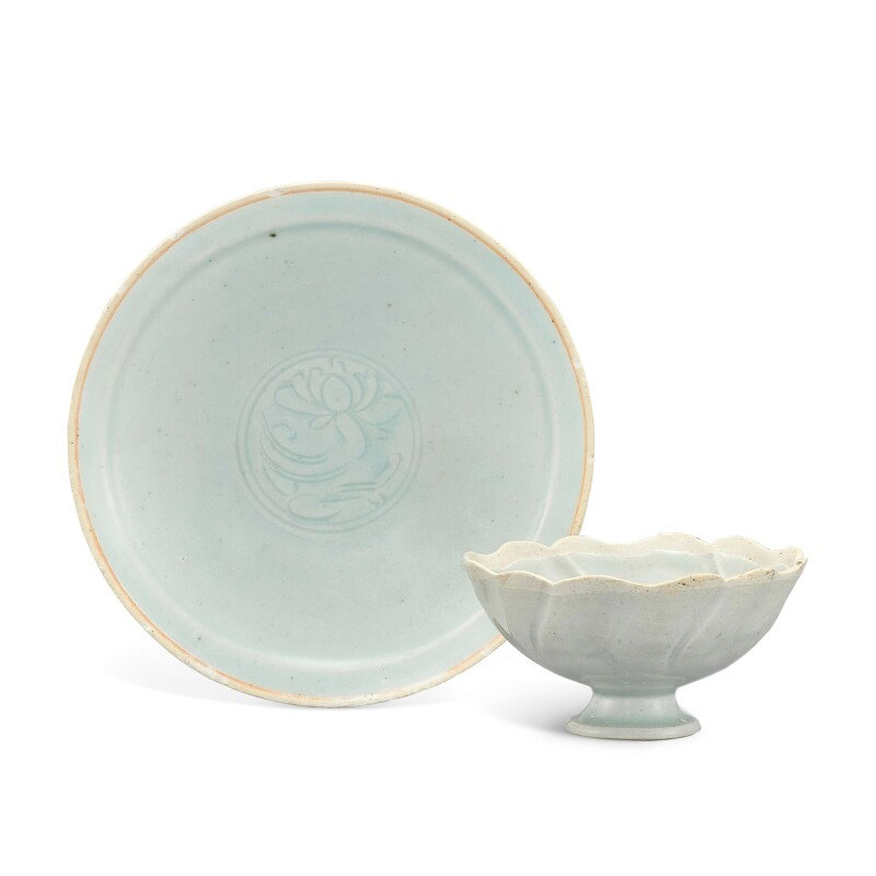 A qingbai 'floral' cup and carved 'lotus' dish, Song dynasty