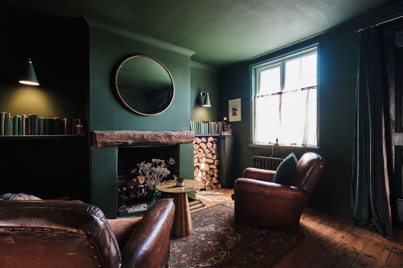 moody-dark-green-sitting-room-leather-club-chairs-nordroom