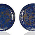 A pair of powderblue-ground gilt painted dragon dishes, <b>Guangxu</b> marks, <b>Guangxu</b>-Republic period