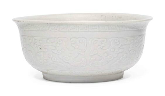 A white-glazed relief-decorated bowl, 18th century
