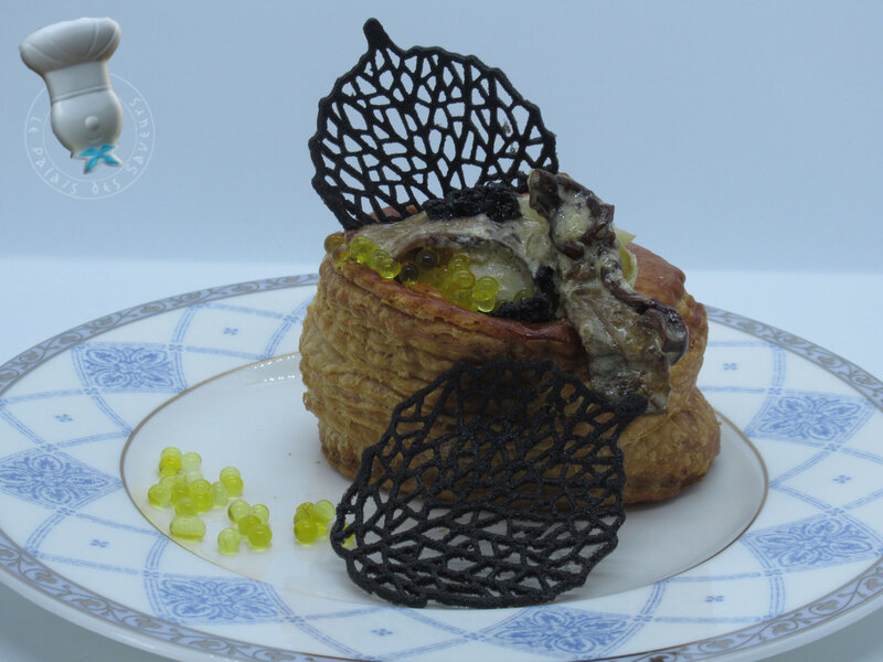 Feuilleté de St Jacques aux cèpes, truffes et perles de citron de Menton